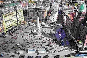 Dam Square overview with Royal Palace and National Monument in Amsterdam