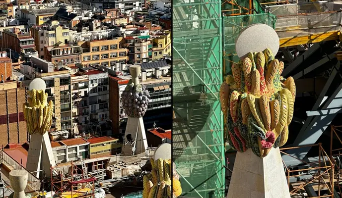 A panoramic view of a city skyline featuring a prominent statue atop a hill overlooking the urban landscape.