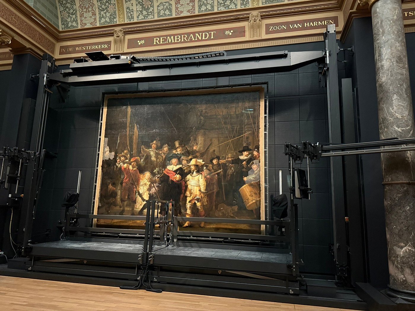 Rembrandt's The Night Watch in a conservation frame at the Rijksmuseum, Amsterdam.