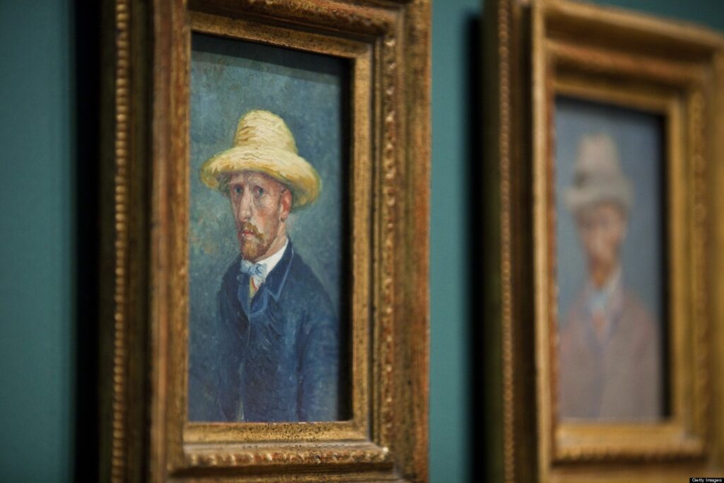 Two classic portraits in wooden frames hang on a green wall. The closer painting features a man with a straw hat and a serious expression, while the second portrait fades into the background. The art evokes an impressionist style.